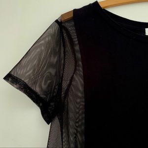Cute Forever 21 black top with mesh panel!